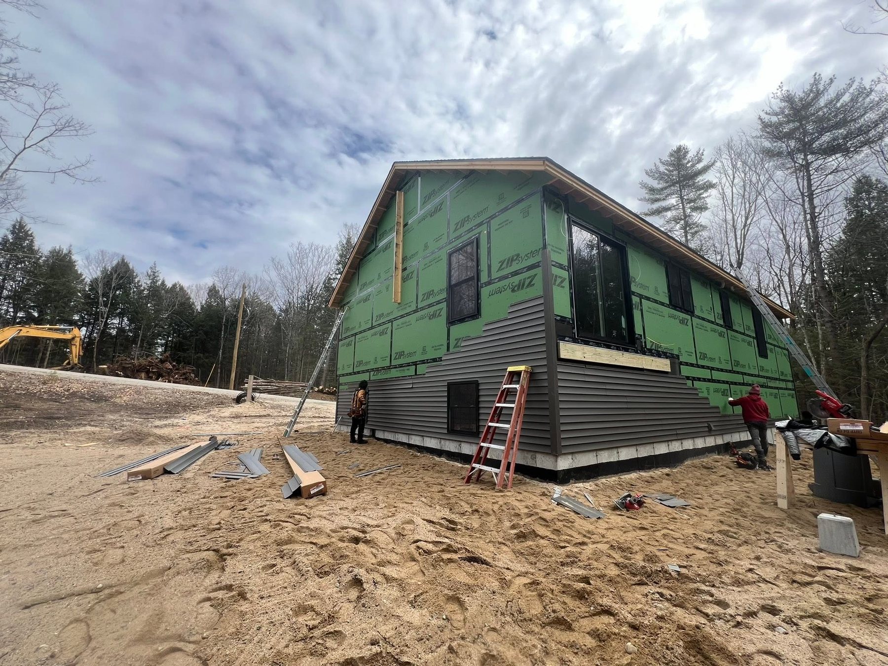 Exterior siding installation in progress
