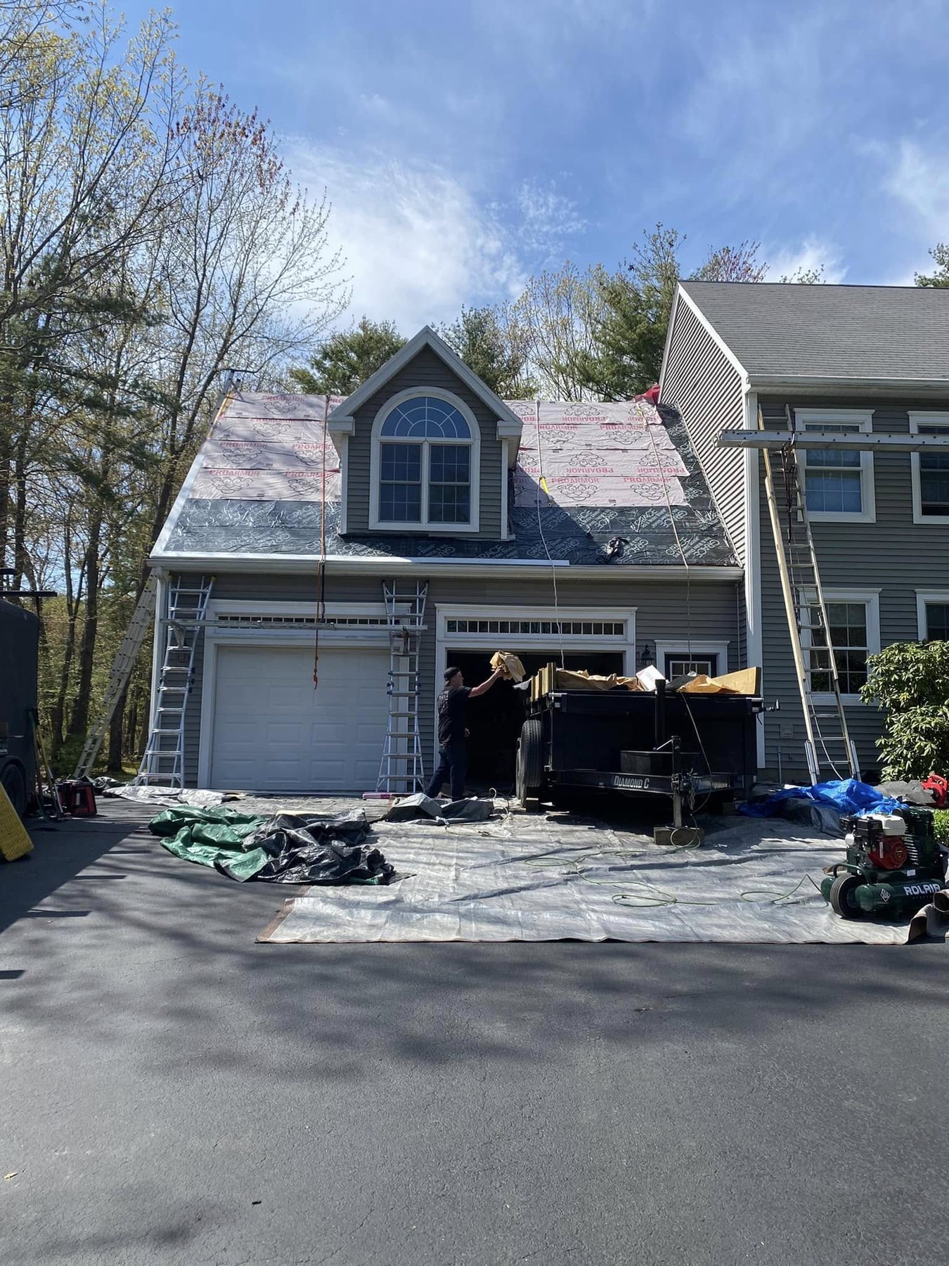Residential roof replacement in progress